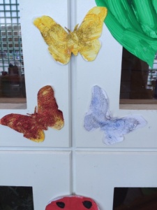 We made glittery butterflies