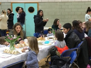 Mummies and Daddies enjoying  our Mother's Day Tea.
