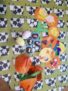 Our Pre-schoolers' brilliant Easter egg paintings and paper flowers.